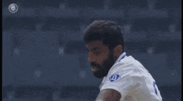 a cricket player with a bat in his mouth is being chased by another player .