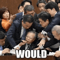 a group of people are sitting around a table with a sign that says `` would '' .