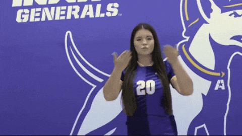 a girl with the number 20 on her shirt