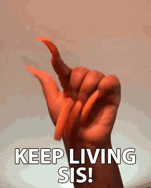 a woman 's hand with very long orange nails says keep living sis