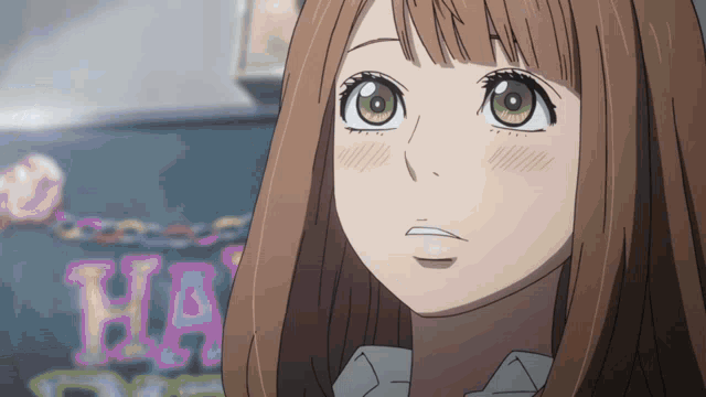 a close up of a girl in front of a sign that says happy