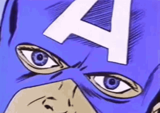 a close up of captain america 's face with a white letter a on his mask .