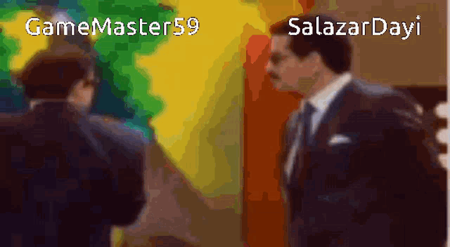 a man in a suit and tie is standing next to another man in a suit and tie with gamemaster59 written on the bottom