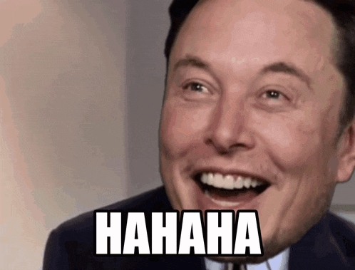 a man in a suit and tie is laughing with the word hahaha above his head