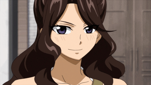 a close up of a woman 's face with a purple eye
