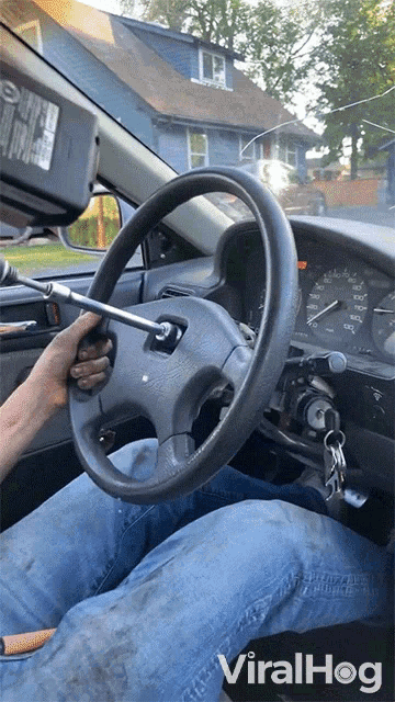 Fixing The Steering Wheel Viralhog GIF