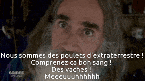a man with long hair and a beard says nous sommes des poulets d' extraterrestre