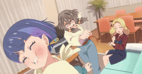 a group of anime girls are standing in a room