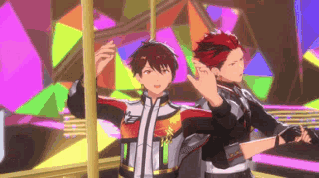 two anime characters are standing next to each other on a stage and making a peace sign .