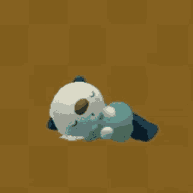 a cartoon otter is laying on its back on the floor .