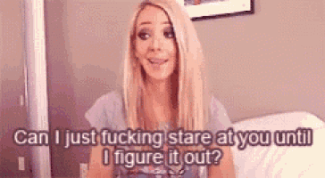 a blonde woman is sitting on a couch and says can i just fucking stare at you until i figure it out