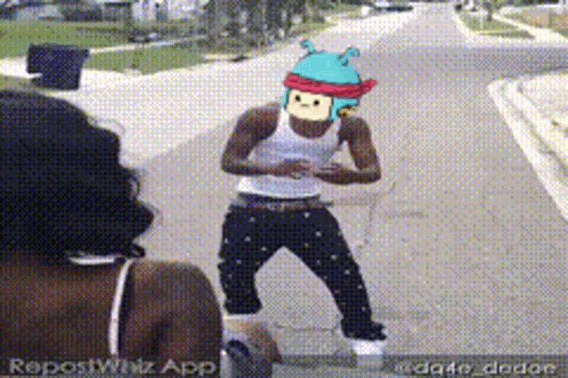 a man wearing a monkey headband is standing on a sidewalk next to a woman