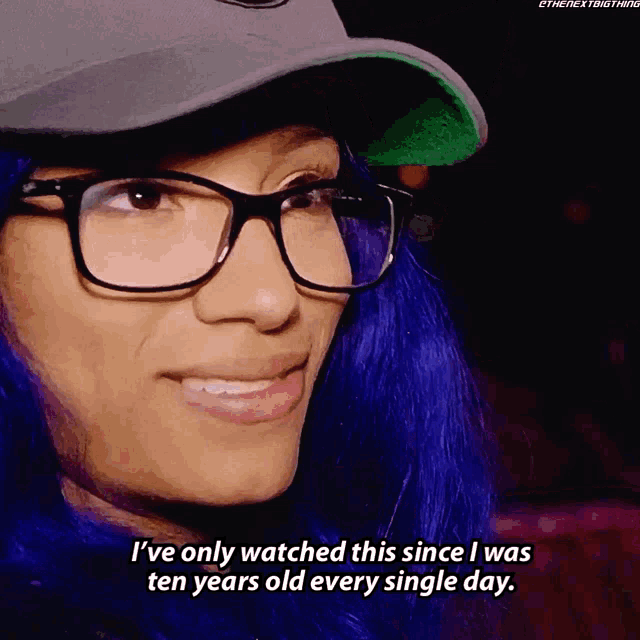 a woman with blue hair and glasses says " i 've only watched this since i was ten years old every single day . "