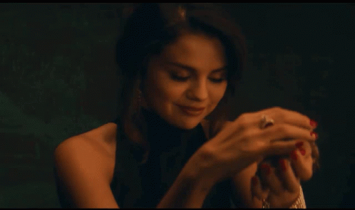 Selena Gomez Boyfriend GIF - Selena Gomez Boyfriend Playing With Frog GIFs