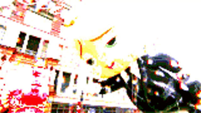 a blurry picture of a man riding a motorcycle