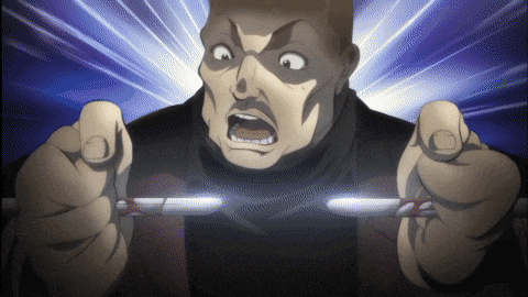 a man with a surprised look on his face is holding two sticks