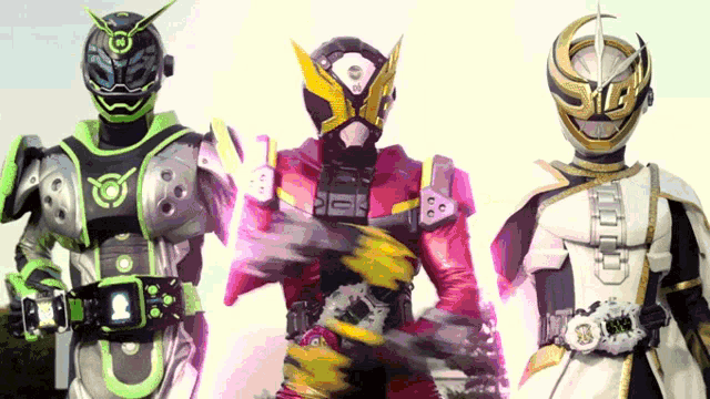 three kamen riders are standing next to each other and one of them has a belt with the number 8 on it
