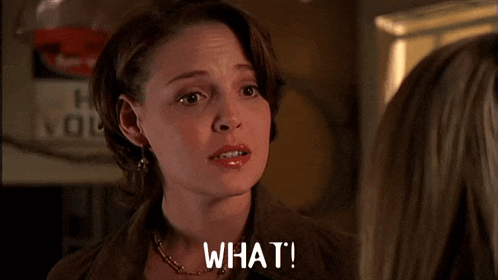 a woman says what in front of a sign that says hn vol