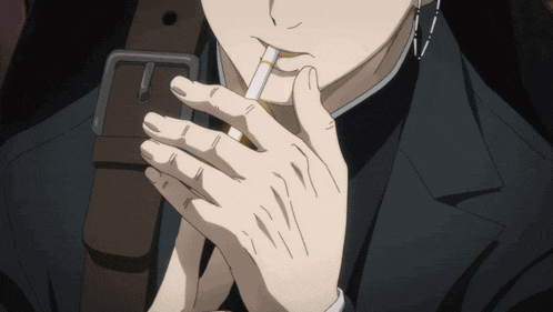 a man is smoking a cigarette with his hands folded
