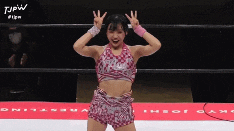 a woman in a wrestling ring with the letters tjpw on the bottom