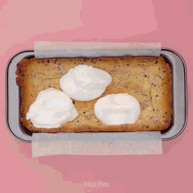 a loaf of ice cream in a pan with the words easy plus on the bottom