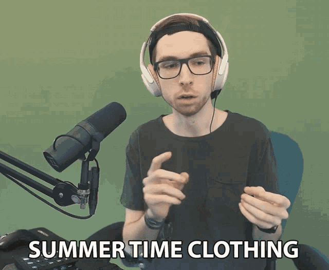 a man wearing headphones and a black shirt says " summer time clothing "