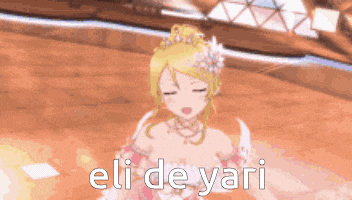 a girl in a wedding dress with the words eli de yari written on it .