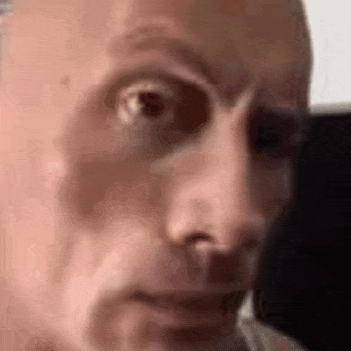 it is a close up of a man 's face with a black eye .