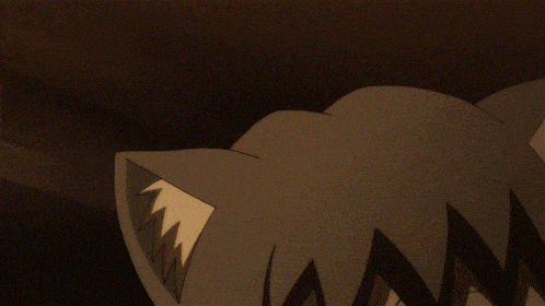 a close up of a cartoon character 's face with a cat ear