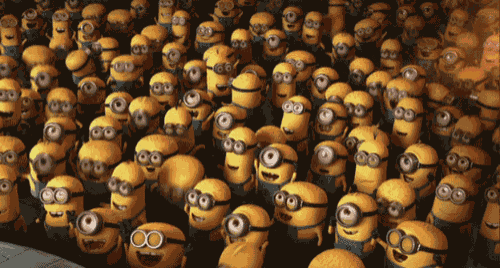 a bunch of minions are gathered together and smiling for the camera