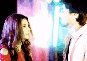 a man and a woman are standing next to each other