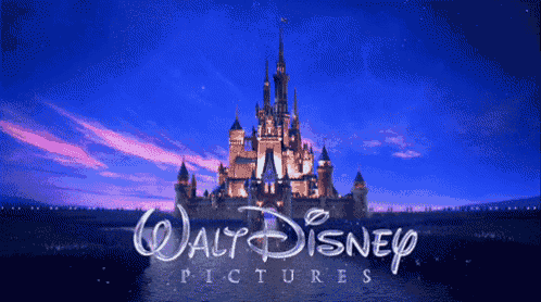 a walt disney pictures logo with a castle in the foreground