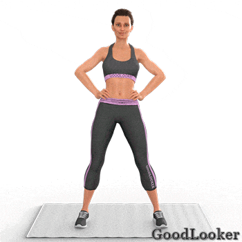 a woman is standing on a mat with her hands on her hips and the words goodlooker on the bottom right