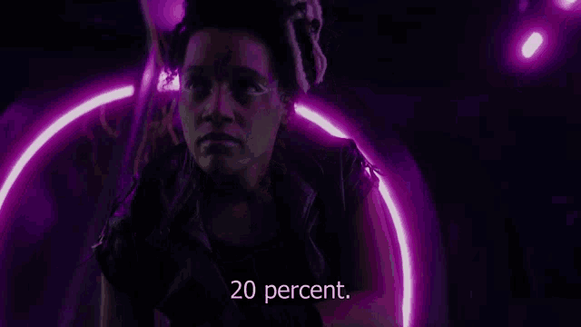 a woman in a dark room with purple lights and the words 20 percent