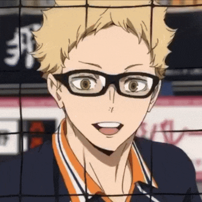 a close up of a person wearing glasses behind a net .