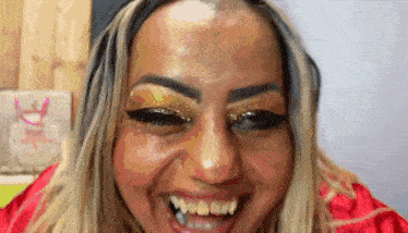 a close up of a woman making a funny face with her mouth open