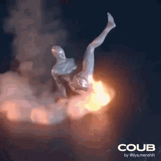 a statue of a man falling into a fire with coub written on the bottom