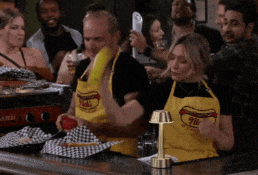 How I Met Your Father Making Hot Dogs GIF - How I Met Your Father Making Hot Dogs Condiments GIFs