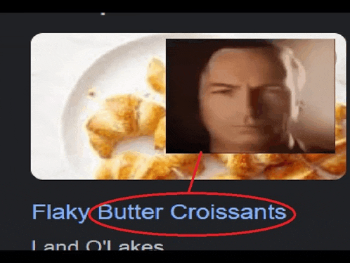 a picture of flaky butter croissants with a man 's face on it