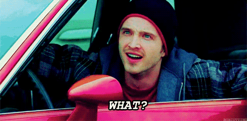 a man is sitting in a pink car and says what