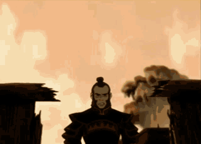 a man with a bun on his head is standing in front of a burning building .