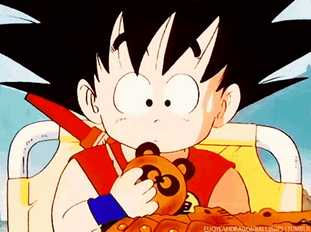 a cartoon of a boy holding a stuffed animal with the words euqyeahdragonballzgifs tumblr written below him