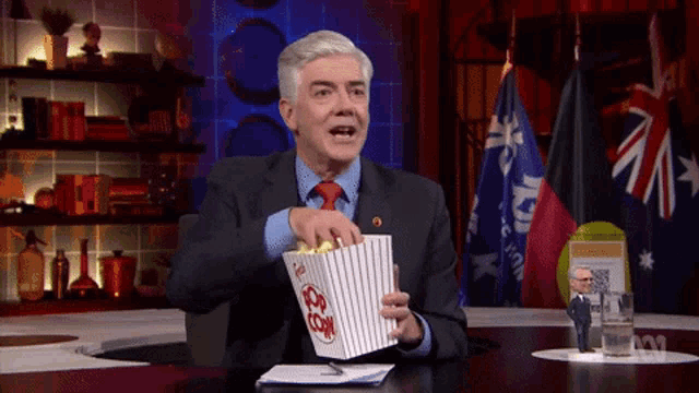 Mad As Hell Shaun Micallef GIF - Mad As Hell Shaun Micallef Popcorn GIFs