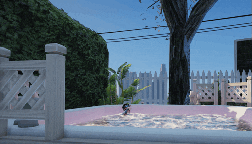 a person is sitting in a hot tub with a white picket fence behind them