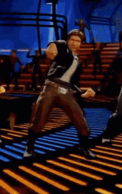 a cartoon character is dancing on a dance floor in a video game .