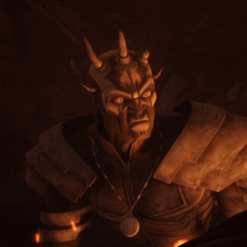 a man with horns on his head and a necklace