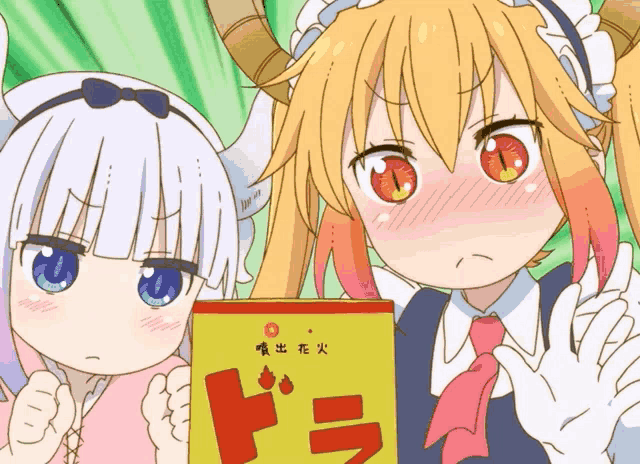 a couple of anime girls standing next to each other with a box that says ' dora ' on it