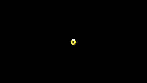 a close up of a yellow smiley face with black eyes and a white mouth