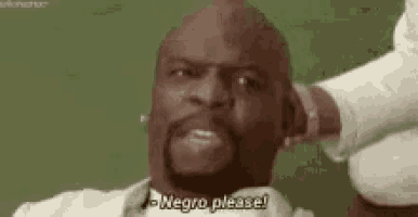 a man with a beard and mustache is sitting down and talking to someone .
