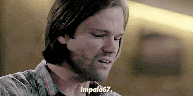 a close up of a man 's face with impala67 written on the bottom